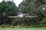 Yak 50 im Landeanflug vor herrlicher Waldkulisse beim Flugtag 2008 auf dem Flugplatz Weser-Wmme am 30.08.08