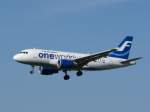 Finnair A 319-112 mit  oneworld  Lackierung bei der Landung in Zrich-Kloten am 28.4.2010.