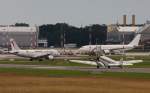 Tunisair,TS-IMK,(c/n880),Airbus A319-114,05.08.2012,HAM-EDDH,Hamburg,Germany(rechts D-AQUI Ju-52,hinten ganz in weiss VP-CBE Hongkong Jet Airbus A330-202)