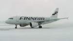 Finnair Airbus A319-112, OH-LVA, auf dem Flughafen Kuopio, Finnland, am 8.3.13