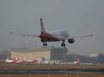 Air Berlin(Belair) A 320-214 HB-IOW kurz vor der Landung in Berlin-Tegel am 09.03.2012