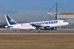 TS-INH  Mohamed Aziz Milad  / Nouvelair / A320-214 bei der Landung in MUC aus Enfidha (NBE) 28.12.2013
