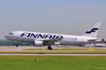 OH-LXC / Finnair / A320-214 in MUC bei der Landung aus Helsinki (HEL) 10.06.2014