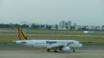 Tiger Airways mit der Kennung 9V-TAY am 18.4.2015 in Saigon. A320
