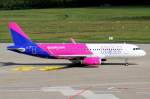 Wizz Air HA-LYT in neuen Farben rollt zum Start in Köln 27.9.2015