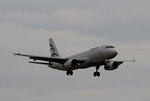 Aegean A 320-232 SX-DGX bei der Landung in Berlin-Tegel am 19.12.2015