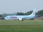 Eine TUIfly Boeing 737 in Stuttgart auf dem Rollfeld am 29.08.2008.