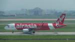 9M-AJD von Air Asia am 14.4.2015 in Hanoi. Boeing 737-800