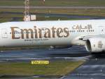 Emirates, A6-EMX, Boeing, 777-300 (Schriftzug und Turbine), 06.01.2012, DUS-EDDL, Düsseldorf, Germany 
