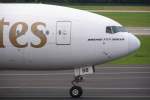 Emirates B777-300ER A6-EBB on Taxyway M on wa to RWY 23L @ DUS. 04.08.2012