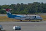 LX-LGG, Bombardier DHC-8-400 von Luxair, auf dem Rollfeld vom Flughafen in Luxemburg.