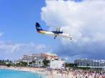 DCH Dash-8 V2-LFF von liat Caribbean Airlines im Endteil auf St. Maarten (SXM)5.3.2013