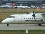 Eine Lufthansa Regional De Havilland Canada DHC-8-300 auf dem Frankfurter Rollfeld am 07.08.2008.
