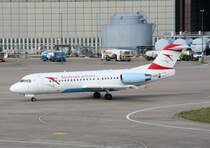 Austrian Arrows Fokker 70 OE-LFG bei der Ankunft auf dem Flughafen Berlin-Tegel am 26.07.2009