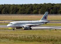 Qatar Airways A 319-133LR A7-CJB bei der Ankunft auf dem Flughafen Berlin-Tegel am 12.09.2009