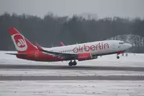 B737-700 der airberlin beim Start. Eine der ersten Maschinen von airberlin mit dem  Ruhr 2010 - Aufkleber. Sehr ungem�tliches Wetter, aber trotzdem relativ gutes Bild. (Sony A200, Sigma 70-300)