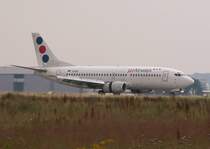 Die YU-ANL der JAT Airlines bei der Landung auf der 23R in Dsseldorf. Die Reverser am Triebwerk sind deutlich zu erkennen. Das Foto stammt vom 09.07.2007