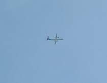 Eine DHC-8-402Q Dash8 der Luxair �berfliegt den Bahnhof von Luxemburg am 03.02.08.