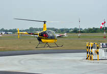 Robinson R 22 Beta, D-HFER, an der Tankstelle am Flugplatz Bonn-Hangelar 
20.05.2011