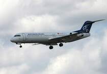 Montenegro Airlines Fokker 100 4O-AOT bei der Landung in Frankfurt am Main am 16.08.2012