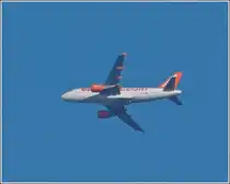 Airbus 319-111, Kennung G-EZET von EeasyJet gesehen nahe Dippach in Luxemburg am 05.03.2012. 