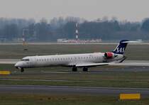 SAS Canadair Regjet CRJ900ER OY-KFK bei der Ankunft in Dsselsorf anm 11.03.2013