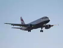 British Airways A 320-232 G-EUYH bei der Landung in Berlin-Tegel am 30.12.2013