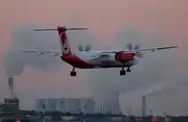 Air Berlin DHC-8-402Q D-ABQK bei der Landung in Berlin-Tegel am 19.10.2014